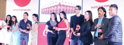 Coca Cola Unveils New Label