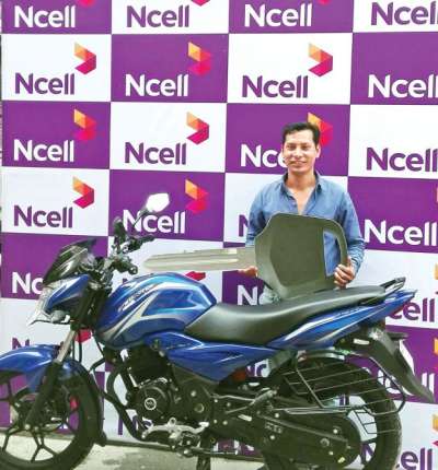 Ncell Hands Over Bike to Shrestha