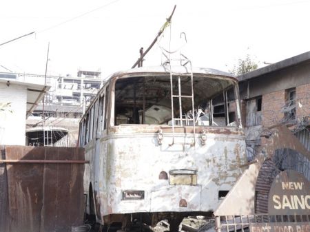 Trolley Buses Mocking the Government from Junkyard