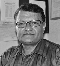 Dr Krishna P Adhikari 