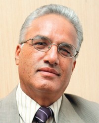 Dr Som P Pudasaini, Executive Chairman